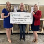 From left: Dr. Christen H. Duhé, president and executive director of GCCF; Tammy Harris, president of FJCASP; are and Lisa Birmingham, director of Grants and Scholarships at GCCF.
